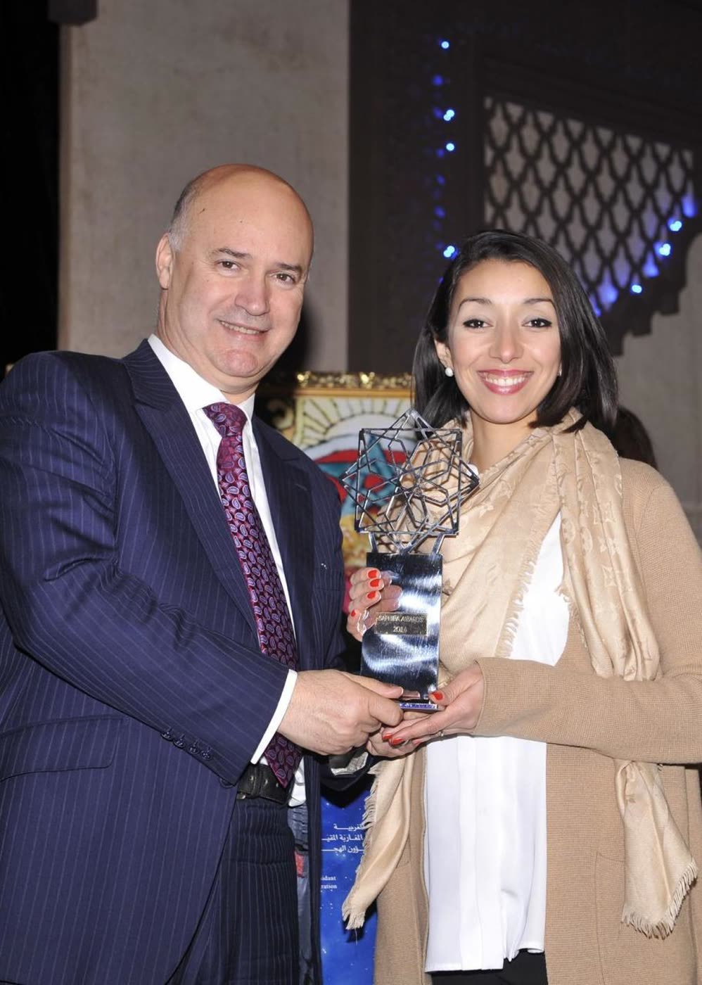 Raja Skogland holding the Safara Awards trophy