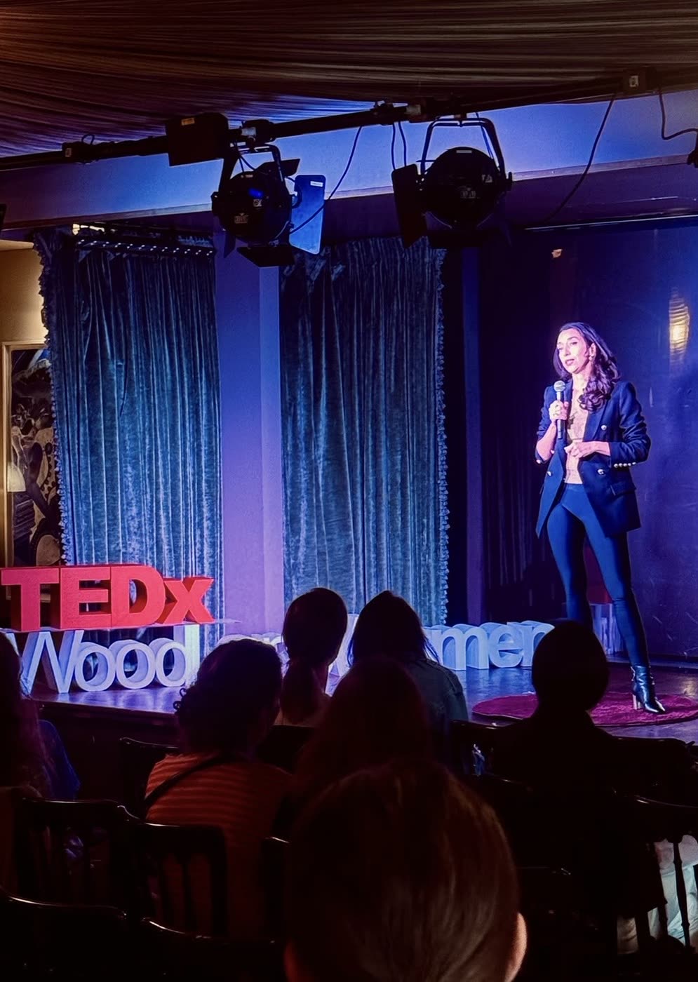 Raja Skogland speaking on the TEDx stage